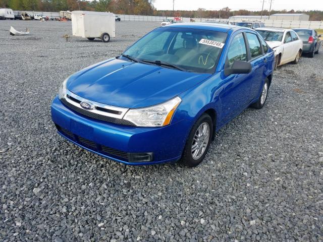 Photo 1 VIN: 1FAHP3FN1AW221744 - FORD FOCUS SE 