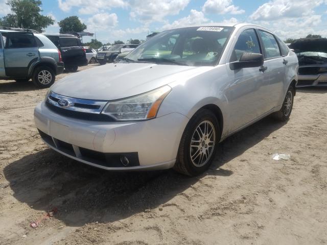 Photo 1 VIN: 1FAHP3FN1BW142575 - FORD FOCUS SE 