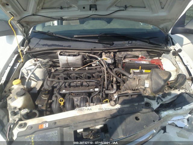 Photo 9 VIN: 1FAHP3FN3AW199052 - FORD FOCUS 