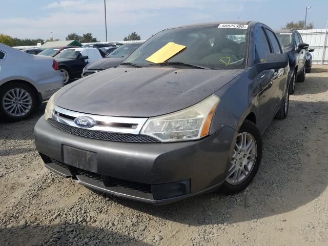 Photo 1 VIN: 1FAHP3FN3AW297093 - FORD FOCUS SE 