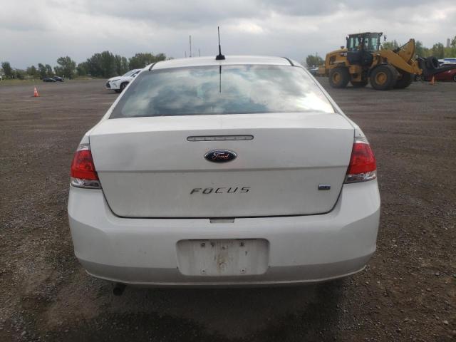 Photo 5 VIN: 1FAHP3FN4AW187749 - FORD FOCUS SE 