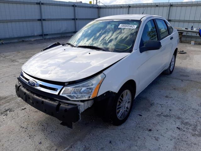 Photo 1 VIN: 1FAHP3FN4AW261607 - FORD FOCUS SE 