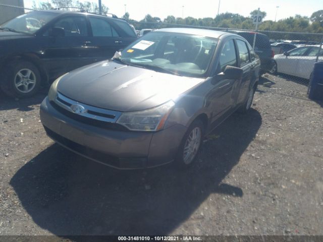 Photo 1 VIN: 1FAHP3FN5AW116852 - FORD FOCUS 