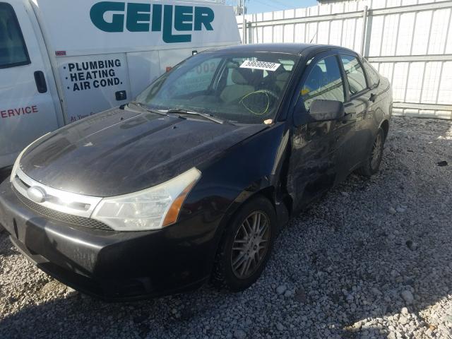 Photo 1 VIN: 1FAHP3FN5AW151813 - FORD FOCUS SE 