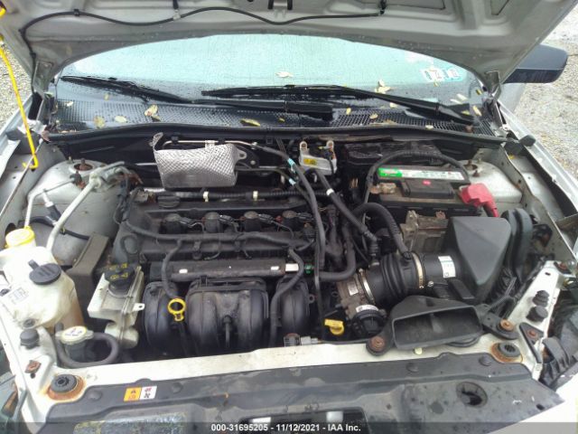 Photo 9 VIN: 1FAHP3FN5BW100474 - FORD FOCUS 