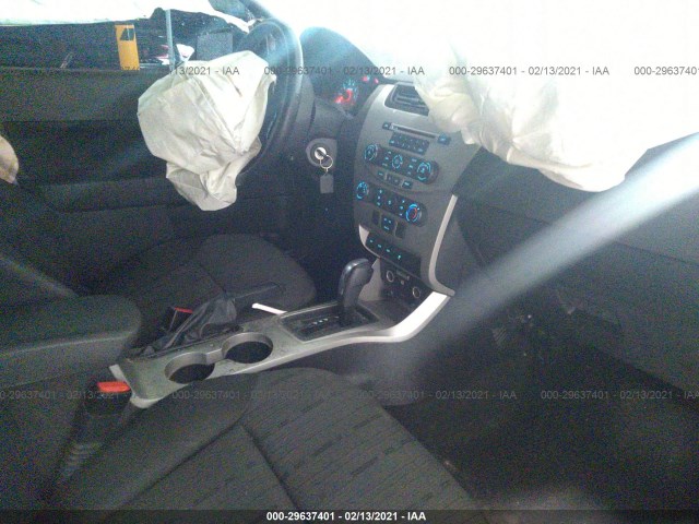 Photo 4 VIN: 1FAHP3FN6BW102296 - FORD FOCUS 