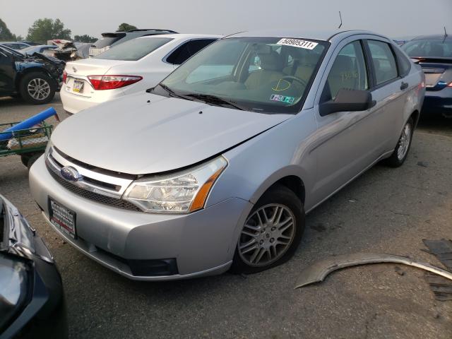 Photo 1 VIN: 1FAHP3FN8AW148713 - FORD FOCUS SE 