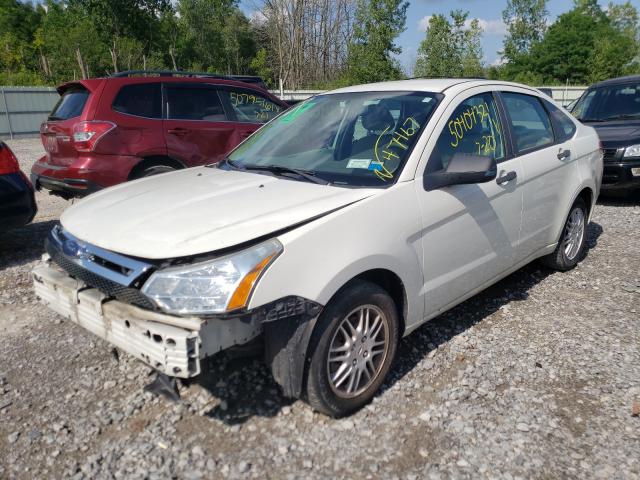 Photo 1 VIN: 1FAHP3FN8AW205735 - FORD FOCUS SE 