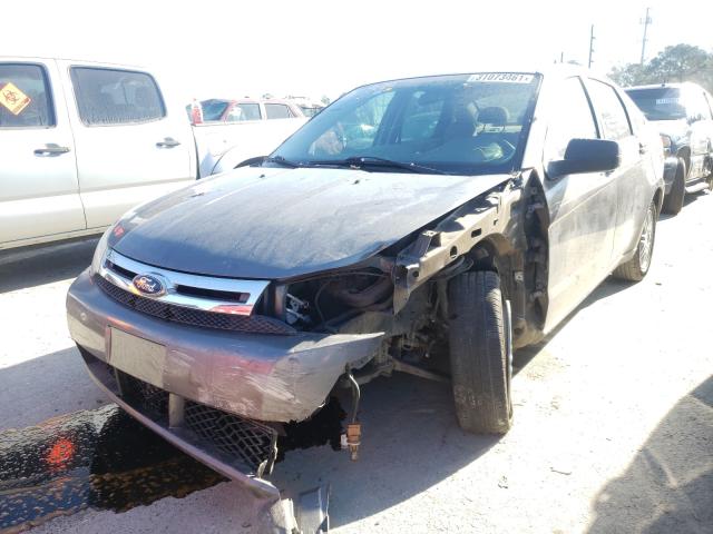 Photo 1 VIN: 1FAHP3FN8BW101067 - FORD FOCUS SE 