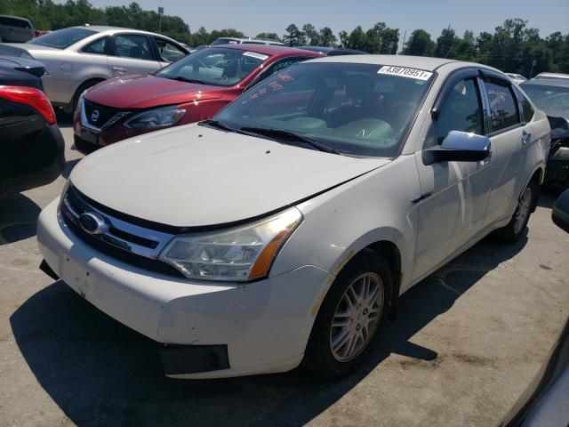 Photo 1 VIN: 1FAHP3FN8BW120797 - FORD FOCUS SE 