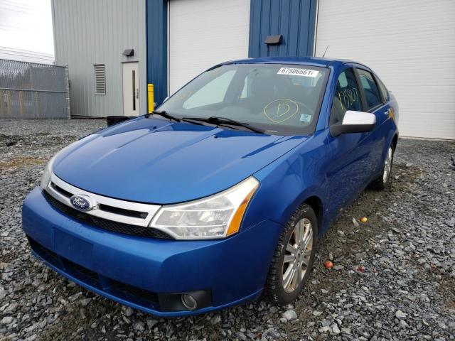 Photo 1 VIN: 1FAHP3FN8BW128074 - FORD FOCUS SE 