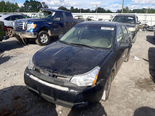 Photo 1 VIN: 1FAHP3FN9BW141559 - FORD FOCUS SE 