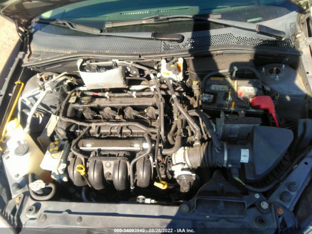 Photo 9 VIN: 1FAHP3FNXAW282591 - FORD FOCUS 