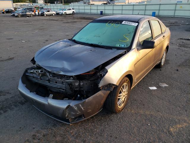 Photo 1 VIN: 1FAHP3FNXBW140386 - FORD FOCUS SE 