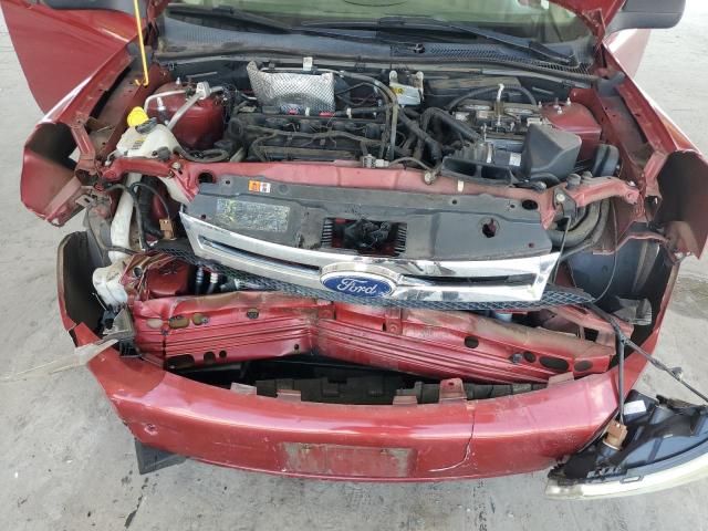 Photo 10 VIN: 1FAHP3FNXBW167104 - FORD FOCUS 