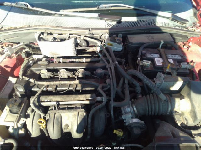 Photo 9 VIN: 1FAHP3FNXBW188891 - FORD FOCUS 