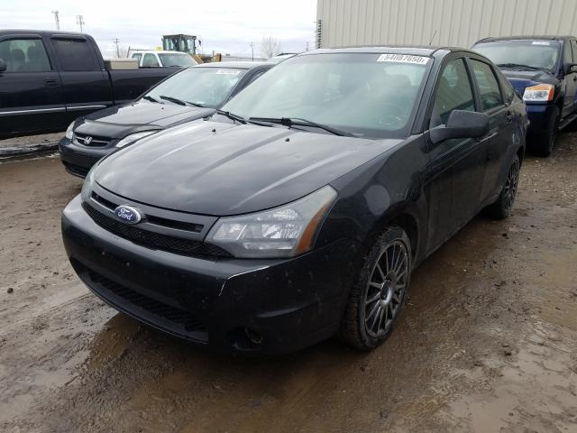 Photo 1 VIN: 1FAHP3GN0AW244849 - FORD FOCUS SES 