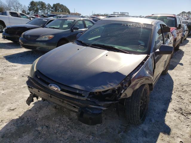 Photo 1 VIN: 1FAHP3GN1BW142283 - FORD FOCUS SES 