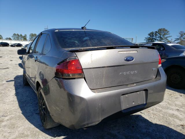 Photo 2 VIN: 1FAHP3GN1BW142283 - FORD FOCUS SES 