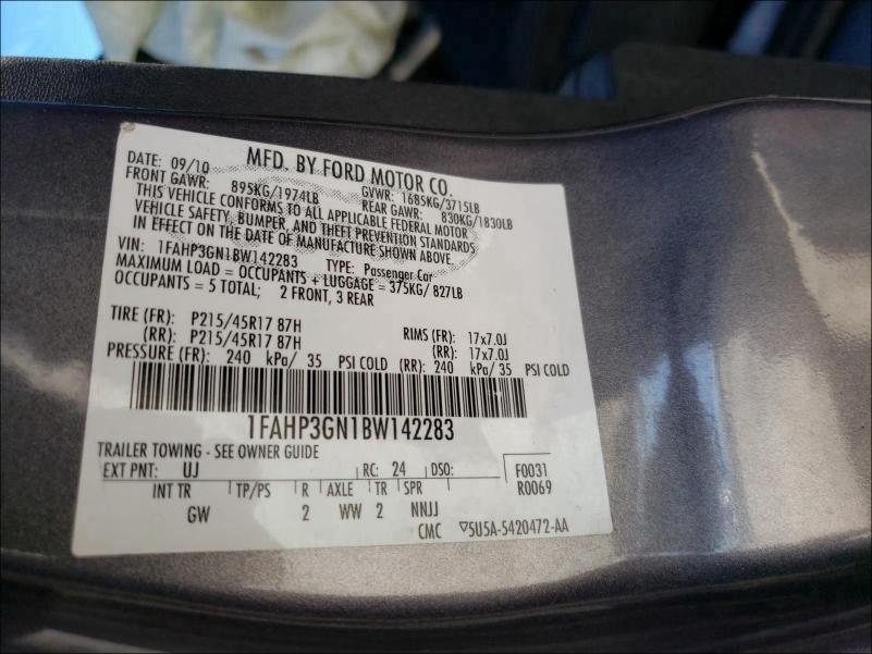 Photo 9 VIN: 1FAHP3GN1BW142283 - FORD FOCUS SES 