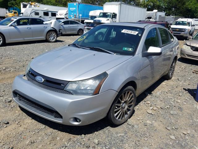 Photo 1 VIN: 1FAHP3GN2BW184896 - FORD FOCUS SES 