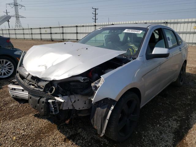 Photo 1 VIN: 1FAHP3GN8AW182486 - FORD FOCUS SES 