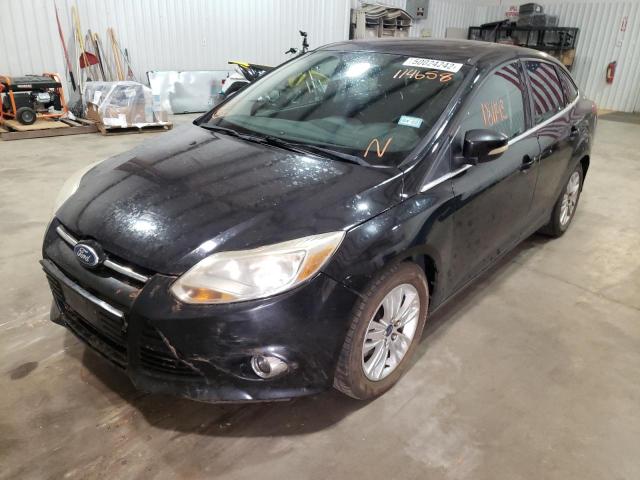 Photo 1 VIN: 1FAHP3H20CL114658 - FORD FOCUS SEL 