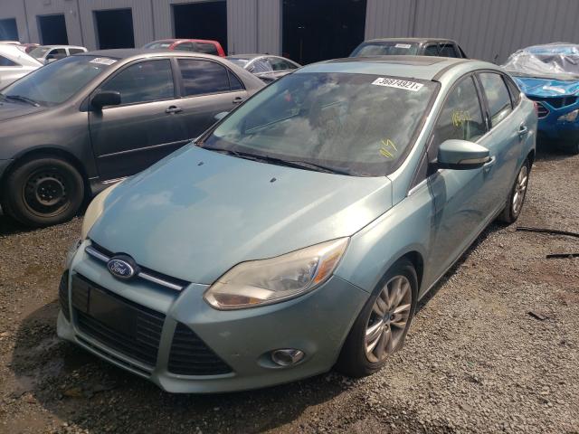 Photo 1 VIN: 1FAHP3H20CL162337 - FORD FOCUS 