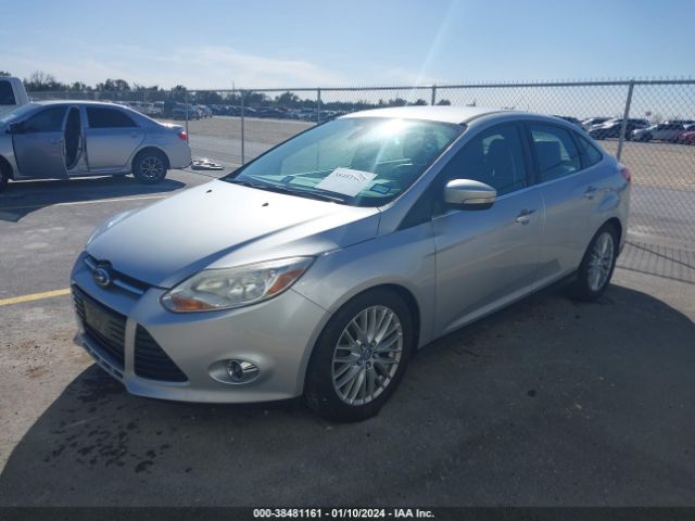 Photo 1 VIN: 1FAHP3H20CL204618 - FORD FOCUS 