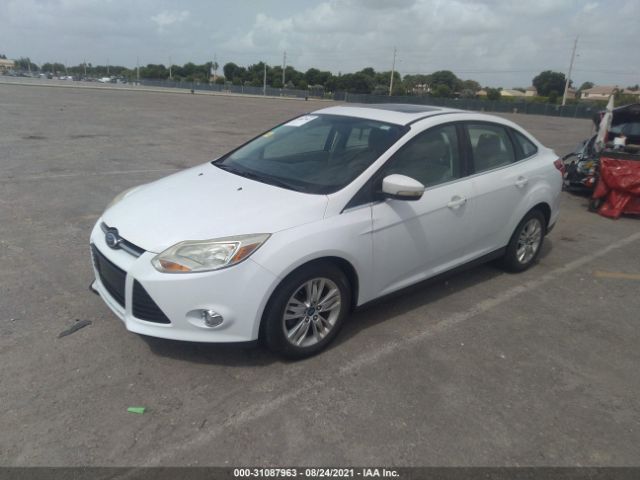 Photo 1 VIN: 1FAHP3H20CL224982 - FORD FOCUS 