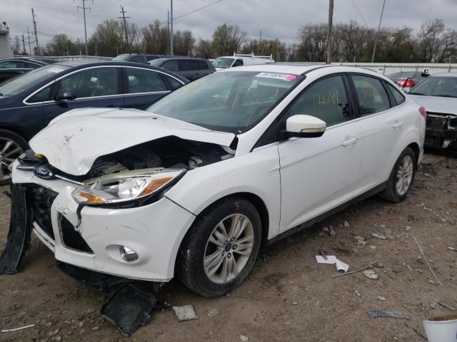 Photo 1 VIN: 1FAHP3H20CL357354 - FORD FOCUS SEL 