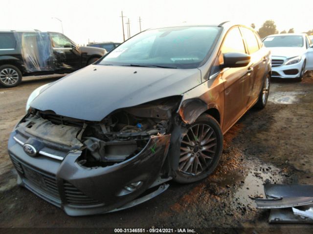 Photo 1 VIN: 1FAHP3H20CL374512 - FORD FOCUS 