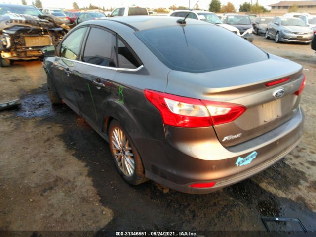 Photo 2 VIN: 1FAHP3H20CL374512 - FORD FOCUS 