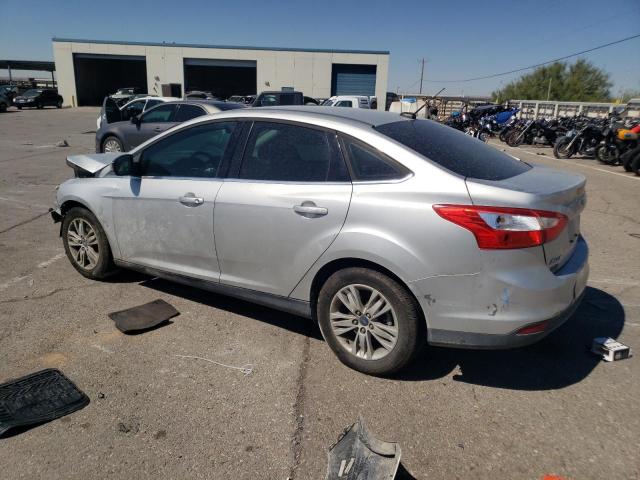 Photo 1 VIN: 1FAHP3H20CL393075 - FORD FOCUS SEL 