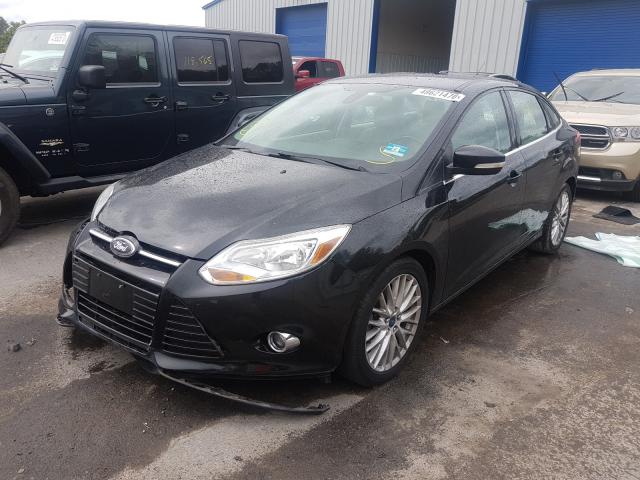 Photo 1 VIN: 1FAHP3H20CL432618 - FORD FOCUS SEL 