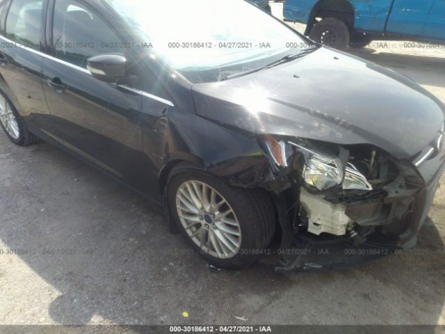 Photo 5 VIN: 1FAHP3H20CL449144 - FORD FOCUS 