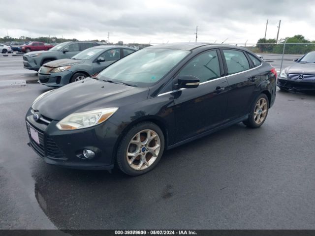 Photo 1 VIN: 1FAHP3H21CL128617 - FORD FOCUS 