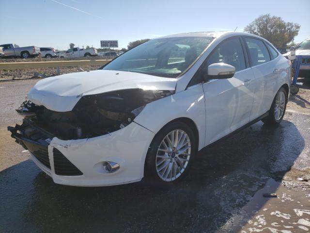 Photo 1 VIN: 1FAHP3H21CL131923 - FORD FOCUS SEL 