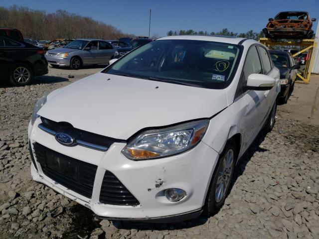 Photo 1 VIN: 1FAHP3H21CL140461 - FORD FOCUS SEL 