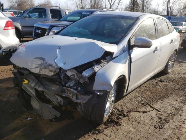 Photo 1 VIN: 1FAHP3H21CL215563 - FORD FOCUS SEL 