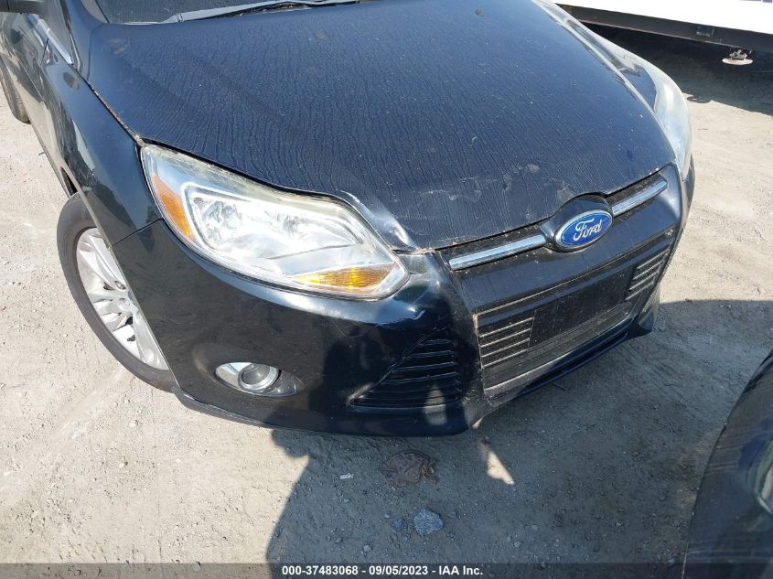 Photo 5 VIN: 1FAHP3H21CL249339 - FORD FOCUS 