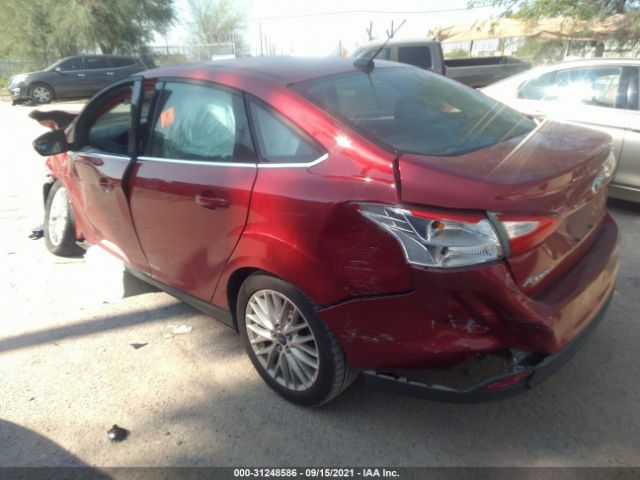 Photo 2 VIN: 1FAHP3H21CL285452 - FORD FOCUS 