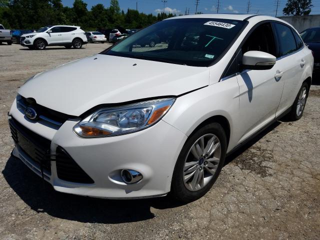 Photo 1 VIN: 1FAHP3H21CL309829 - FORD FOCUS SEL 