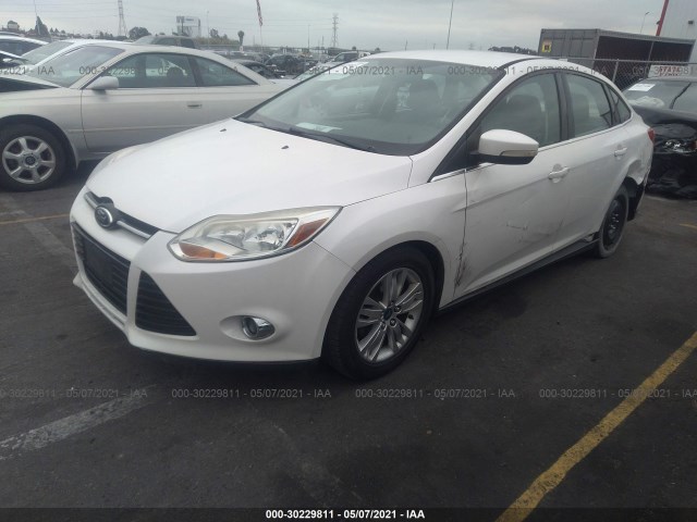 Photo 1 VIN: 1FAHP3H21CL388077 - FORD FOCUS 