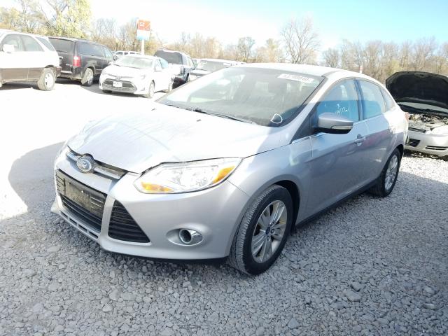 Photo 1 VIN: 1FAHP3H21CL388094 - FORD FOCUS SEL 