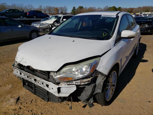 Photo 1 VIN: 1FAHP3H21CL437648 - FORD FOCUS SEL 