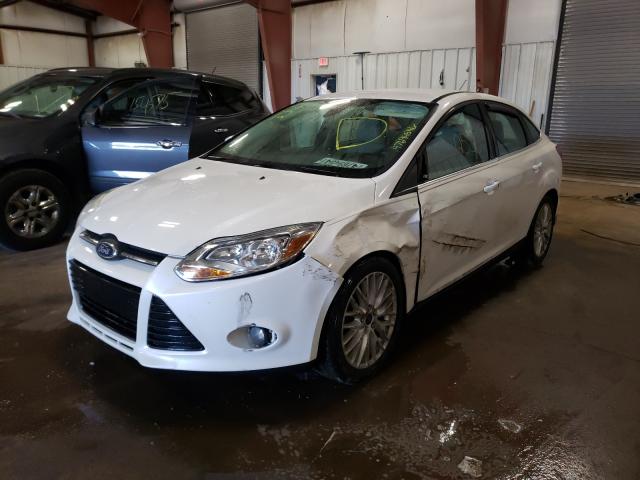 Photo 1 VIN: 1FAHP3H21CL475770 - FORD FOCUS SEL 