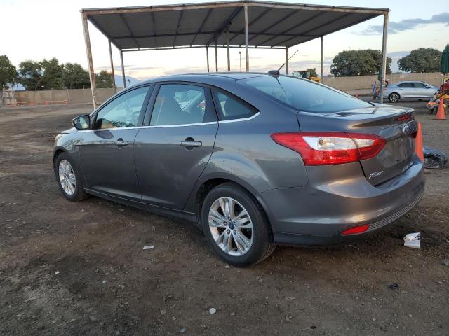 Photo 1 VIN: 1FAHP3H21CL477860 - FORD FOCUS 