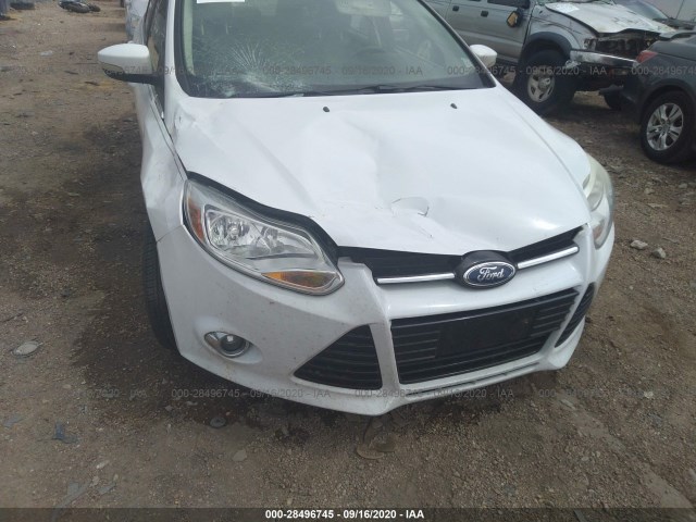 Photo 5 VIN: 1FAHP3H22CL138301 - FORD FOCUS 