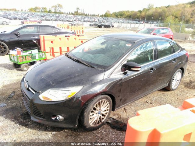 Photo 1 VIN: 1FAHP3H22CL173954 - FORD FOCUS 